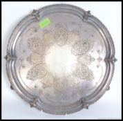 A good quality Victorian Scottish heavy silver plate salver tray with geometric cartouche design to