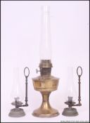 An early 20th century Super Aladdin brass oil lamp with flue.