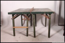 A fabulous pair of Industrial side tables being constructed from a vintage table tennis table.
