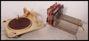 A vintage Collaro high fidelity RC456 record deck together with a sputnik style 45 record holder -