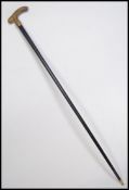 A 15ct gold collar malacca and horn handled walking stick.