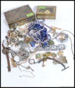 A collection of costume jewellery to include a silver butterfly pendant and chain,