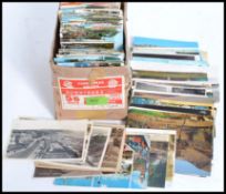A collection of approx 600x postcards - early to mid century, topographical, real photo,