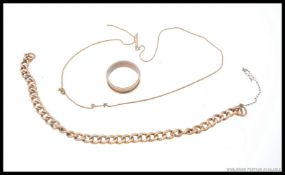 A 9ct gold curb link bracelet along with a 9ct gold necklace along with a brass ring