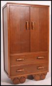 An early 20th century Art Deco style tallboy chest of drawers.