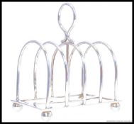 A charming Edwardian silver toast / letter rack.