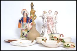 A collection of ceramics to include a Staffordshire flatback, large 3 graces porcelain figurine,
