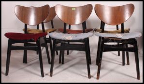 A set of 1960's six butterfly wing chairs by E Gomme for G Plan,