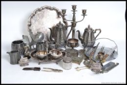 A good quantity of silver plated wares to include salver, bon bon basket, candelabra, teapots,