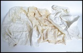 3 early 20th century christening gowns, 1 of silk and lace construction,