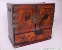 A fabulous Chinese specimin veneer desk top cabinet.