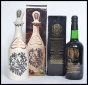 A boxed Bottle of Harvey's Bristol Cream contained in a Coalport Decanter plus a Harvey's Brunel