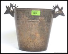 A vintage 20th century silver plated ice bucket - champagne bucket with stag head handles - hunting