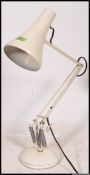 A vintage industrial style white Herbert Terry anglepoise reading lamp light