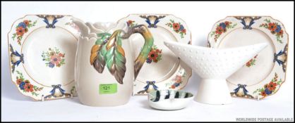 A Clarice Cliff ceramic jug with leaf and cloud design together with Hornsea  vase,