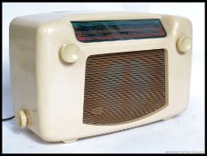 A vintage mid century Kolster Brandesk / KB white bakelite valve radio,