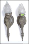 An early to mid 20th Century  wall light fitting in the form of a torch with flame shaped frosted