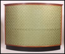 A 1950's retro / vintage upholstered bow front cocktail - drinks bar having teak top,