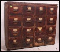 A stunning Victorian Industrial pine bank of twelve drawers,