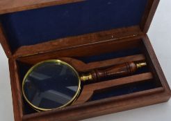 A wooden cased magnifying glass,