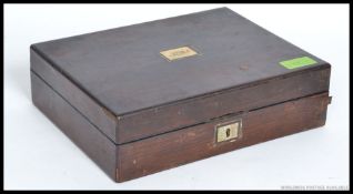 A Victorian rosewood and mother of pearl inlaid writing slope with appointed interior complete with