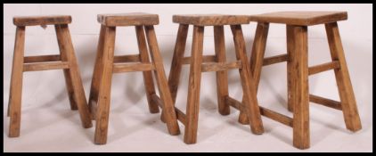 A set of 4 country chunky rustic pine country mid height dining table stools.