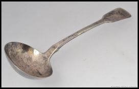 A Georgian silver hallmarked ladle having a London assay mark dated to 1805. 44.