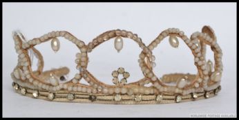 A fabulous early 20th century pearl adorned ladies beaded tiara.