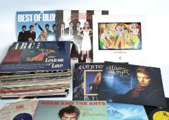A collection of long play vinyl records dating from the late 1970's to include Blondie, Madness,