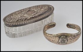 A 20th century Sterling silver American hand beaten ladies bracelet with coat of arms for Chicago