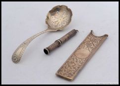 A collection of silver items, all hallmarked, to include a small serving spoon (decorative),