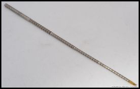 A silver plated vintage cheroot cigarette holder, within the original lined case.