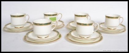 A Royal Albert Paragon - Elgin part tea service, comprising of six cups,