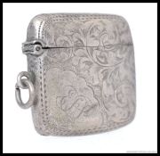 A silver hallmarked vesta being rococo chase with vines. Hallmarks for John Rose, Birmingham 1902.