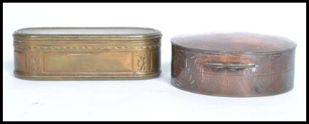An 18th century French cast, engraved and engine turned oblong shaped snuff box with gilt interior.