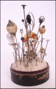 A collection of Victorian and 20th century hatpins to include silver and gold examples.