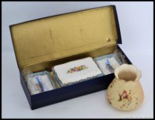 A fabulous boxed unused Royal Crown Staffordshire dressing table set in box together with a Royal