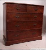 A Victorian walnut 2 over 3 chest of drawers being raised on plinth base with 2 short over 3 deep