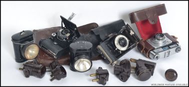 A collection of 3 cameras to include an Ilford and two others.