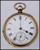 A gilded silver gentlemans pocket watch with roman numeral chapter ring and subsiduary seconds dial
