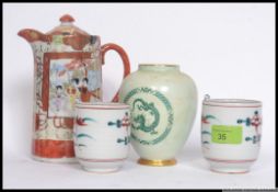 A collection of Chinese - Japanese ceramics to include 2 brush pots,