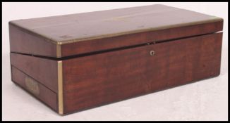 A LARGE 19TH CENTURY MAHOGANY WRITING SLOPE with fitted interior,