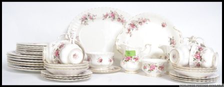A Royal Albert Lavender Rose chintz pattern tea service comprising cups, saucers, plates,