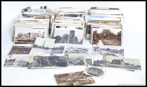 A box of postcards loose to include early 20th century, photographic, replicas, topographical,