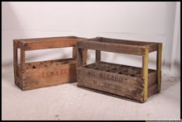 A collection of vintage wooden rustic style wine crates with shabby chic finishes having notation -