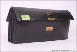 A good early 20th century leather cased handkerchief and gloves case complete with ladies kerchiefs