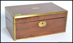 A large 19th century Victorian brass banded Walnut writing slope, with a fully lined interior,