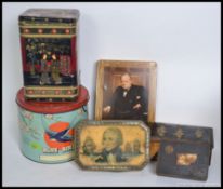 A collection of vintage advertising tins to include a large shop counter Bluebird Toffee tin along