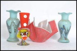 A pair of retro studio end of day vases, handkerchief vase and Murano clown vase.