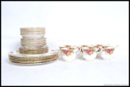 A Royal Albert Old Country Roses part tea service comprising cups, saucers, plates,